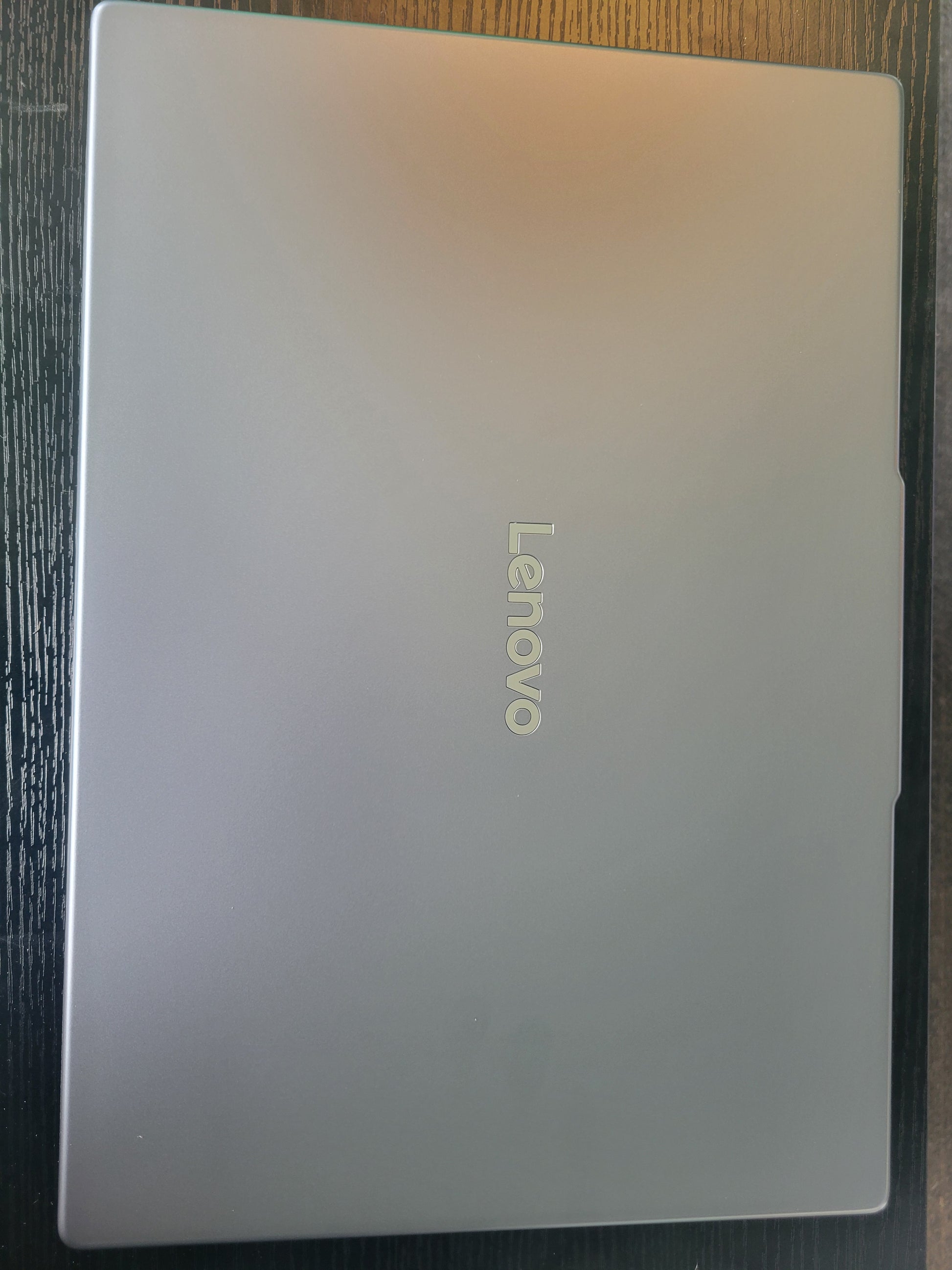 Lenovo laptop on a wooden surface