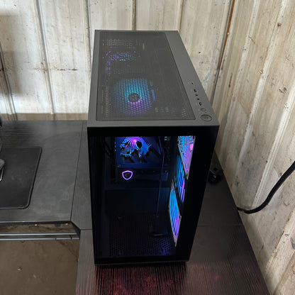 Computer case with RGB lighting on a wooden surface