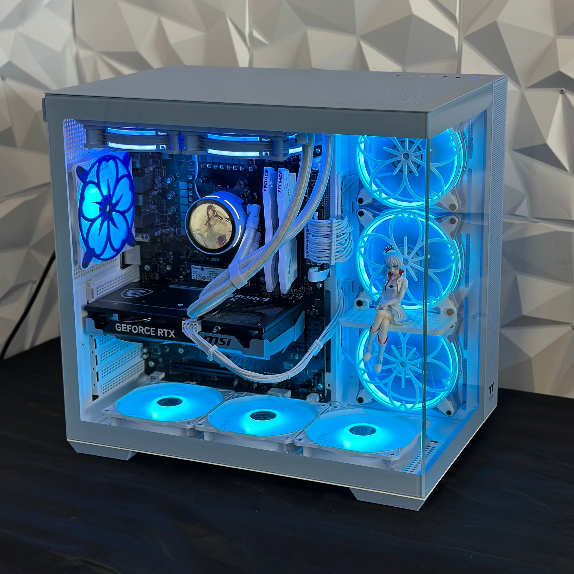 Computer case with blue LED lights on a geometric patterned wall background