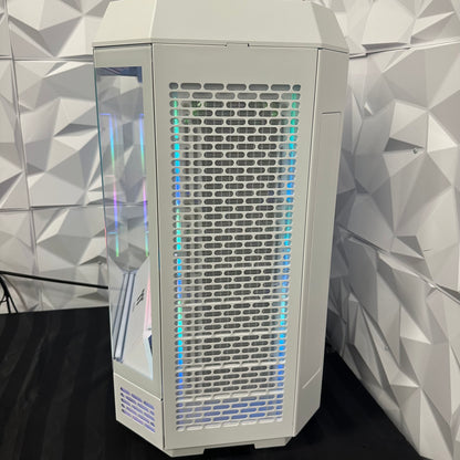 White computer case with RGB lighting on a geometric patterned wall background