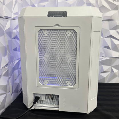 White electronic device with a honeycomb pattern on a geometric background