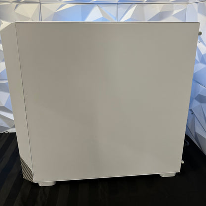 White electronic device on a reflective surface with a geometric background