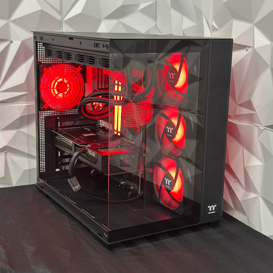 Computer case with red lighting on a geometric patterned wall background