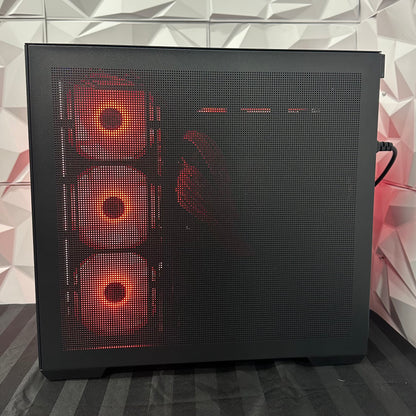 Computer case with red LED lights on a geometric patterned wall background